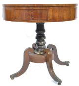 An 18th / 19th Century Georgian circular Indian rosewood rent table. The circular top fitted with