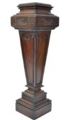 A late 19th / Edwardian mahogany stately home bust stand. Raised on square plinth with inverse