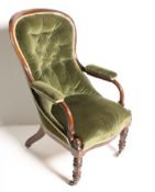 A 19th century Regency Gillows manner rosewood armchair. Raised on inverted tapering legs with