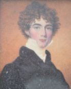 A 19th century portrait miniature painting on ivory plaque depicting a young gentleman. The painting