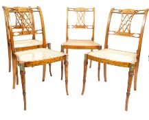 A set of 4 Edwardian marquetry inlaid and stencil hand painted satinwood dining chairs in the manner