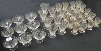 An exceptional set of French drinking glasses dating from the 1920's to include a set of low form