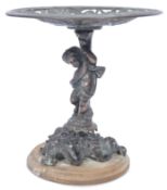 A 19th century bronze tazza centrepiece having an acanthus leaf base on wooden plinth with