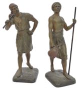 After Jean-Didier Debut (French, 1824-1893): Porteur d'eau Tunisien, a pair of bronze spelter