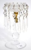 A good 19th century Regency cut glass and gilt metal table lustre. Terraced base with cut and