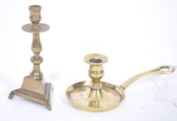2 brass miniature candlesticks, one being an 18th century chamberstick measuring 11.5cms long, the