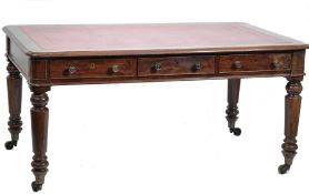 A 19th century Victorian large mahogany partners library table desk. The solid mahogany desk