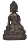 A believed 19th Chinese bronze buddha Amitabha. Hollow cast bronze with remains of gilded and red