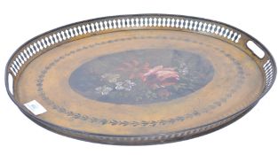 A late 18th century Georgian Pontypool Japanned tray of oval form having a gilt ground with