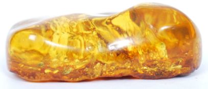 A good amber pebble of believed baltic origin having fabulous impressions of folilage being vivid,