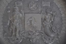 An 18th / 19th century Pewter alms style dish with scalloped edge having repousse decoration of