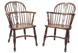 A pair of 18th century Yew wood & Elm country Windsor armchairs / chairs. Each raised on bobbin
