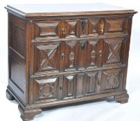A 17th century William and Mary oak chest of drawers having front to back lining raised on stile