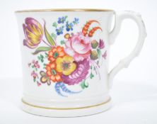A 19th century Staffordshire commemorative wedding mug / loving cup being decorated with a variation