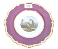 An early 19th century Worcester (Flight, Barr & Barr) claret-ground cabinet plate being decorated