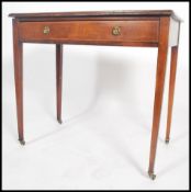 A 19th century mahogany inlaid writing table desk