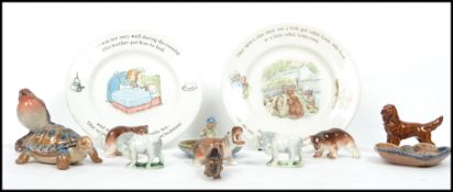 A collection of ceramics to include Wade Whimsies