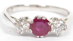 An 18ct white gold ruby and diamond 3 stone ladies
