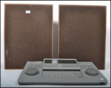 A pair of Sony vintage teak cased speakers along w