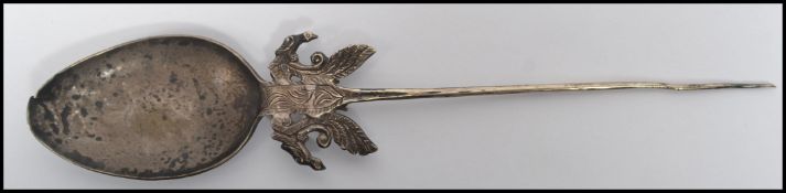 An 18th century silver Tupu dress shawl pin in the
