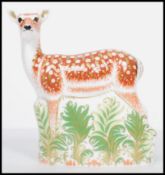 A Royal Crown Derby Fallow Deer paperweight, with red stamp to underside, dated 2013 and gold