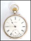 A silver hallmarked gents open faced crown wind lever pocket watch, the enamel face with Roman