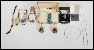 A group of vintage jewellery items to include watches, two micro mosaic banjo brooches, silver owl