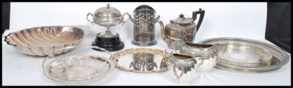A good collection of early 20th century silver plated items to include a stunning lidded fret
