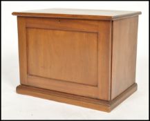 An Edwardian mahogany workbox compendium writing slope cabinet having a fall front panel with