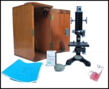 A Vintage Beck of London Microscope. Portable Microscope housed in the original case with three
