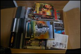 A large collection of cased Film DVD's featuring many different titles and genres from Disney to