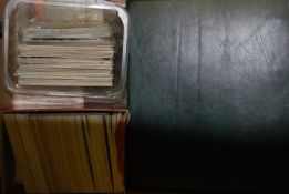 A group of photograph and post card albums along with various postcards and ephemera.