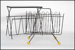 A vintage / retro wire work 20th century magazine rack, the top in the form of a mosaic together