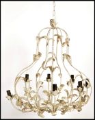 A vintage / retro 20th century pressed metal light fixture, white ground with applied gilt flashes