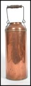 An early 20th century copper airy milk churn having swing handle atop.  measures 37cms high x
