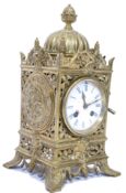 A 19th century French gilt brass mantel clock. The clock having an day movement striking on a bell