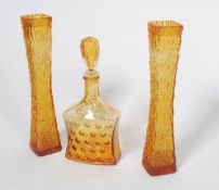 A collection of retro 20th century studio art glass or orange colourway to include pinch tapering