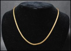 A 9ct gold snake / omega linked chain with c clasp being marked 375. Size 44cms long / weight 11.3g