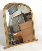 A good 19th century large overmantel mirror. Of wooded gilded form having large arch with plinth