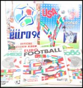 A good group of Panini sticker football world club sticker books to include two Mexico 86 sticker