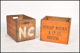 2 vintage wooden Industrial advertising - work crates each with notation for Dunlop having sectional