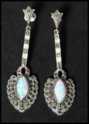 A pair of 925 silver Art Deco style marcasite and opal drop earrings having post backs. Marked 925.