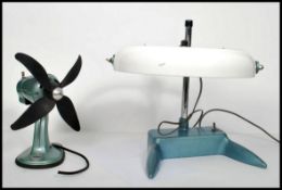 A vintage retro 20th century Allen industrial work desk lamp having an inset magnifying glass