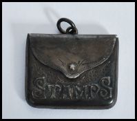 A George V silver stamp case, Birmingham 1911, the front inscribed stamps with marks for C&N / O&