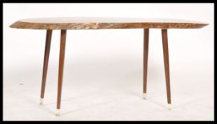 An unusual 20th century map of Fiji wooden coffee table. The naturalistic log top raised on