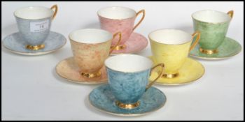 A set of six Royal Albert Gossamer tea cups each with matching saucers. Elegant form with gilt