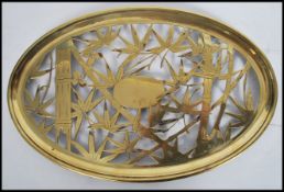 A stunning 19th century copper table tray, the tray having a stunning fret pierced bamboo design