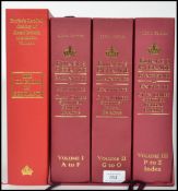 Three Volumes of Burkes Peerage, Baronetage and Knightage 107th Edition with the folder .stand