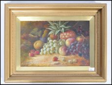 An accomplished framed and glazed oil on board still life painting. The painting depicting fruit