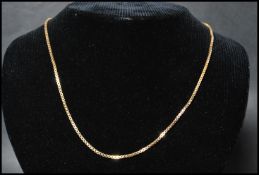 A hallmarked 9ct gold box link necklace chain having a replacement clasp. Chain measures 18 inches